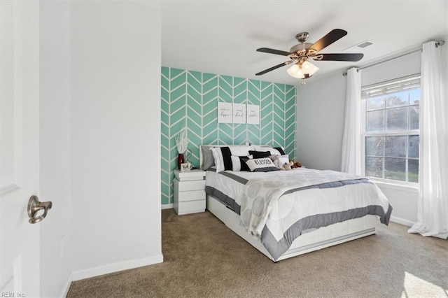 bedroom featuring ceiling fan and carpet floors