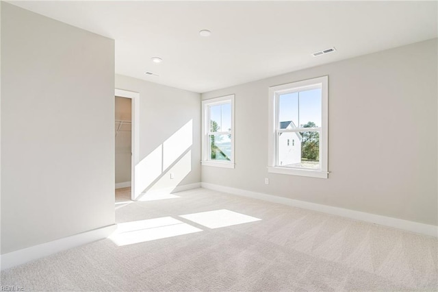 view of carpeted spare room