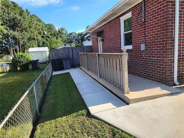 view of yard featuring a wooden deck