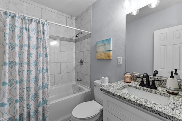 full bathroom with shower / bath combo with shower curtain, vanity, and toilet