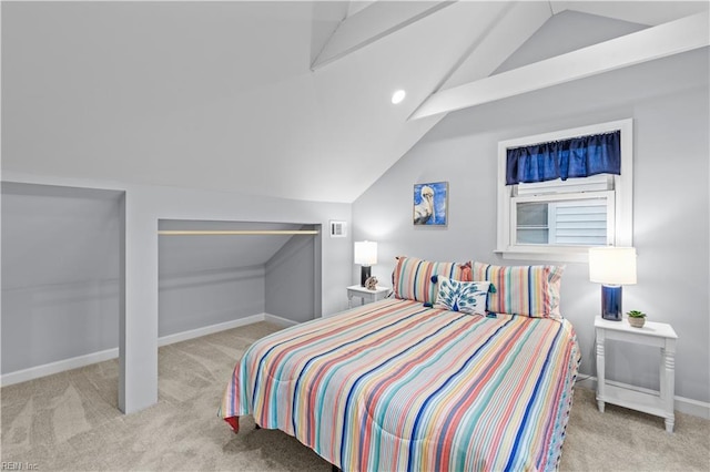 carpeted bedroom featuring lofted ceiling