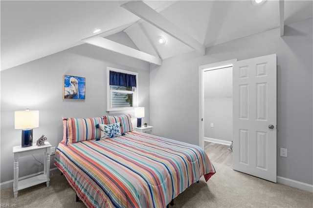 carpeted bedroom featuring vaulted ceiling