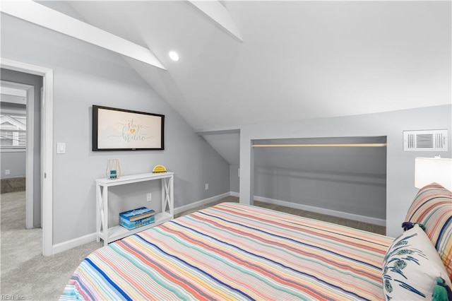 bedroom featuring light carpet and vaulted ceiling