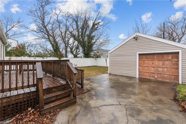 exterior space featuring an outbuilding and a garage