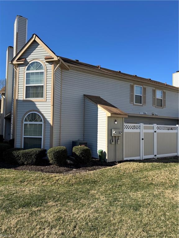 view of home's exterior featuring a yard