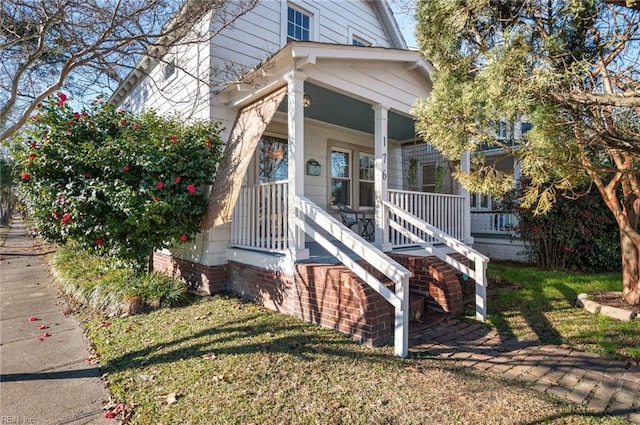 view of front of property featuring covered porch