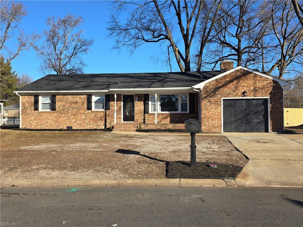 single story home featuring a garage