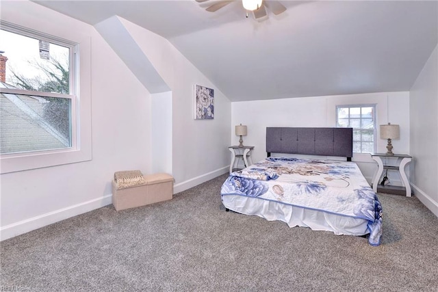 bedroom with carpet flooring, vaulted ceiling, and ceiling fan