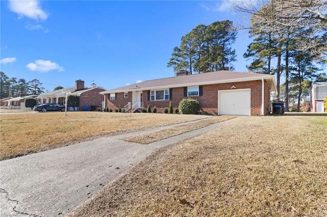 ranch-style house with a front lawn and a garage