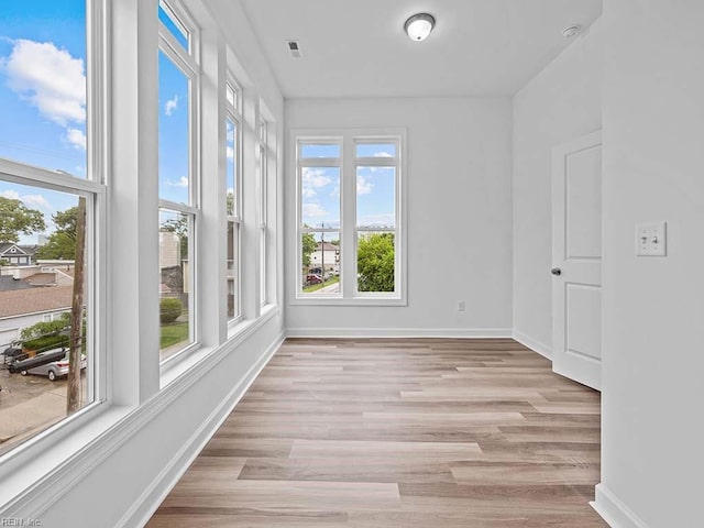 view of unfurnished sunroom