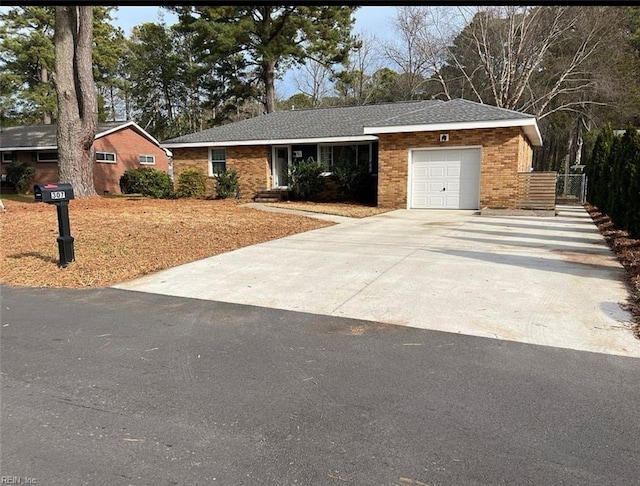 ranch-style house featuring a garage