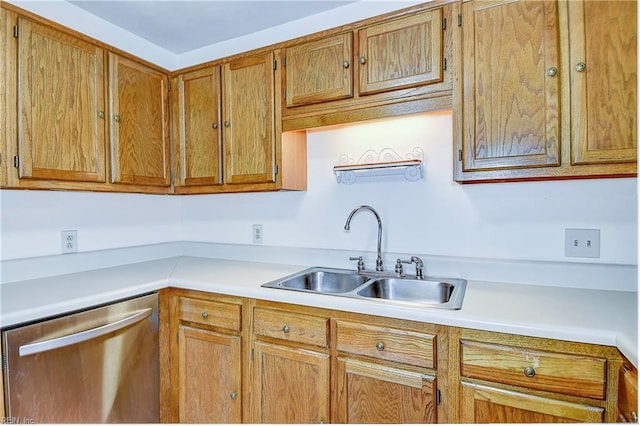 kitchen with stainless steel dishwasher and sink