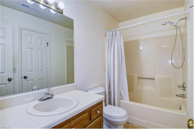 full bathroom featuring shower / bath combination with curtain, toilet, and vanity