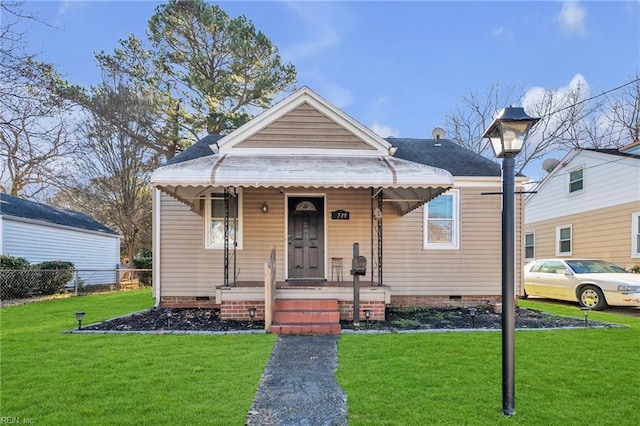 bungalow with a front lawn