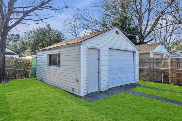 view of outbuilding with a lawn