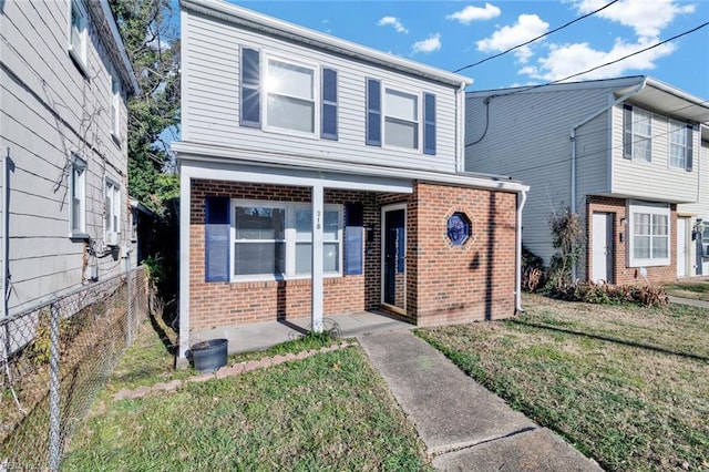 view of front of property with a front lawn