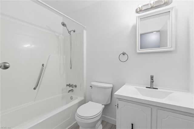 full bathroom with vanity,  shower combination, and toilet