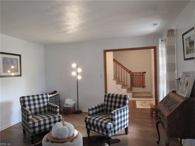 living area with dark hardwood / wood-style flooring