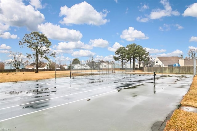 exterior space with tennis court