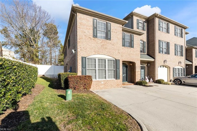 view of property with a front lawn