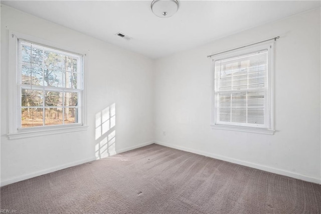 view of carpeted spare room