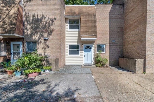 doorway to property with a patio