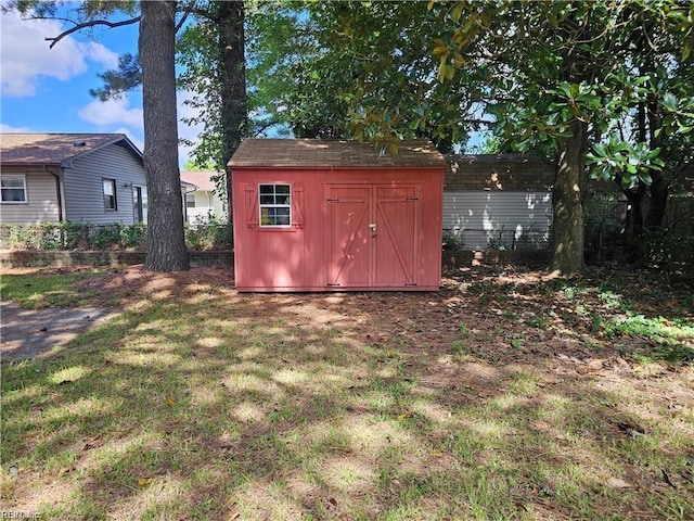 view of outdoor structure featuring a yard