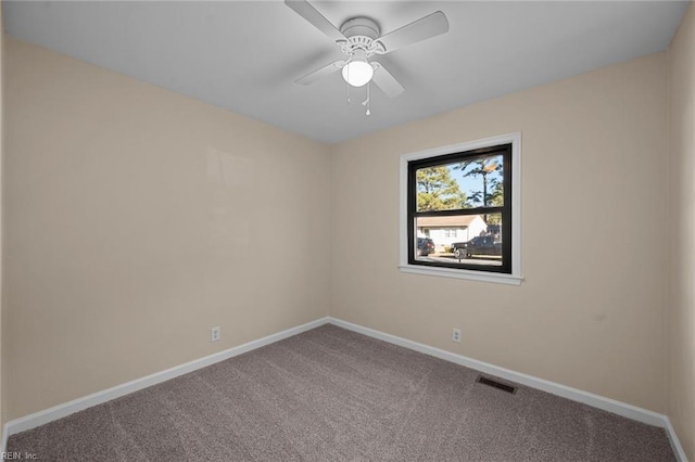 carpeted empty room with ceiling fan