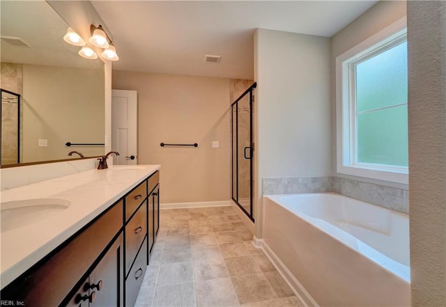 bathroom with vanity and plus walk in shower