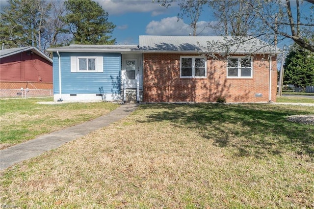 single story home with a front lawn