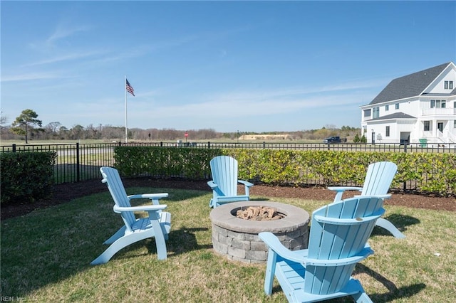 view of yard with a rural view and a fire pit