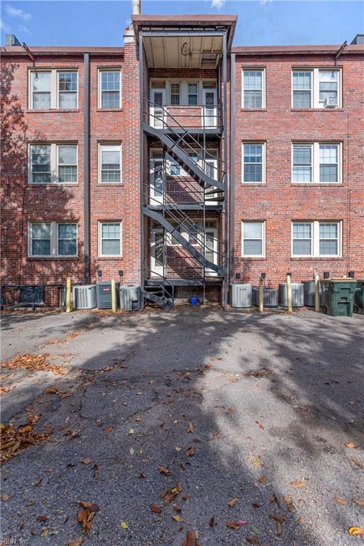 view of property featuring central AC unit