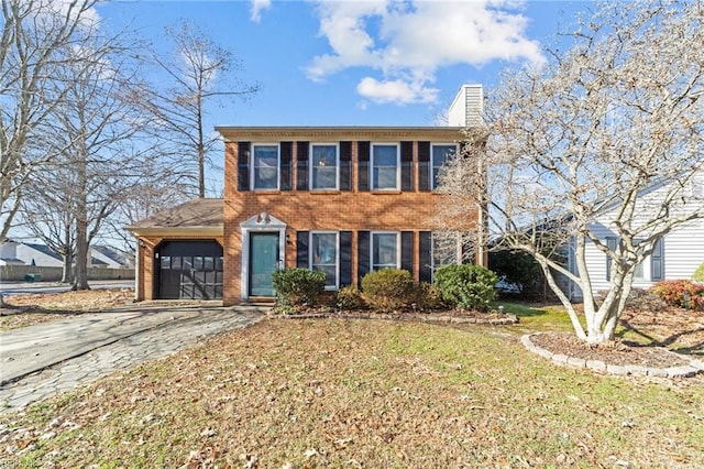 view of front of house with a front lawn and a garage