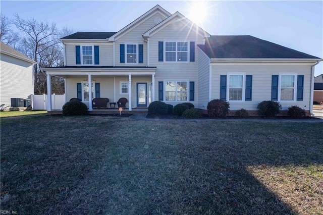 view of front of property featuring a front yard and a porch