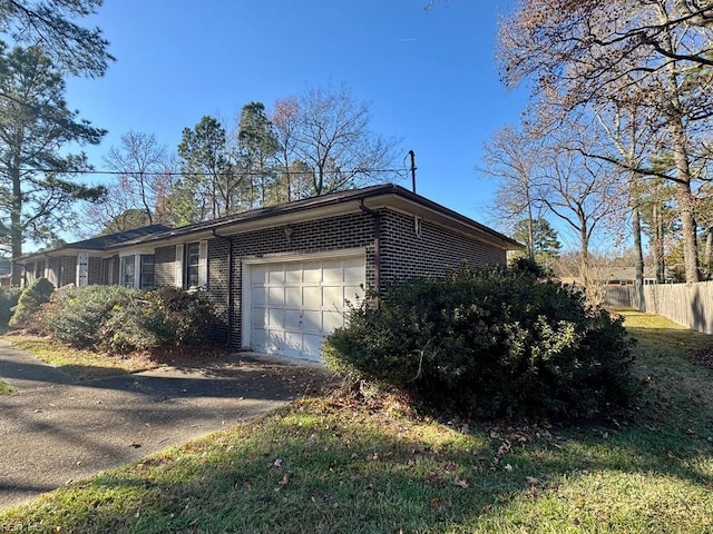 view of side of property featuring a garage