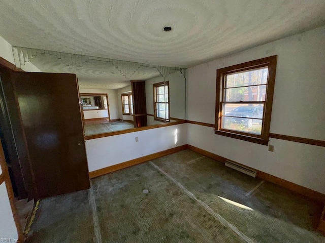 interior space with carpet and plenty of natural light