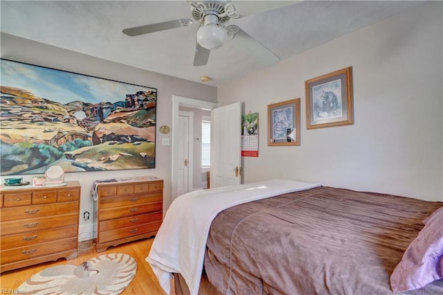 bedroom featuring ceiling fan and light wood-type flooring