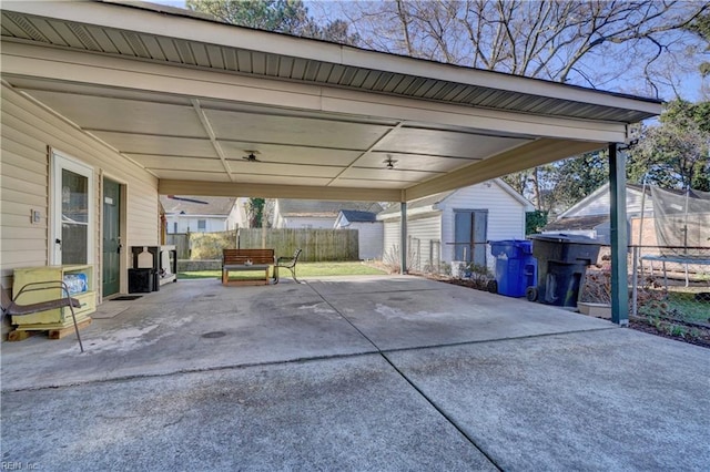 view of patio with a storage shed