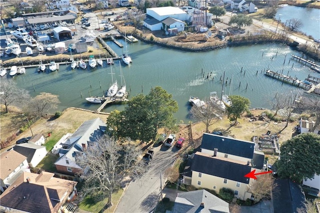 bird's eye view with a water view