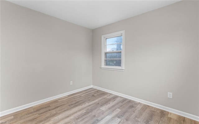 empty room with light wood-type flooring