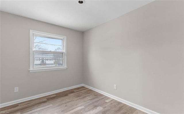 empty room with light wood-type flooring