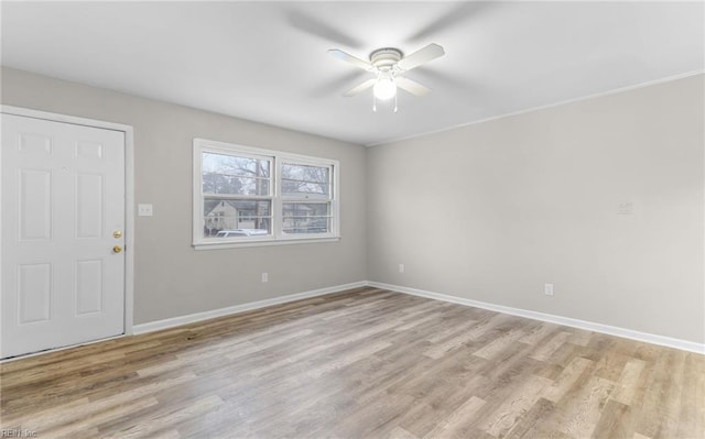 unfurnished room with ceiling fan and light hardwood / wood-style floors