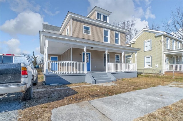 view of front of property featuring covered porch