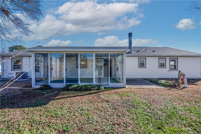 back of house with a patio, central AC unit, and a sunroom