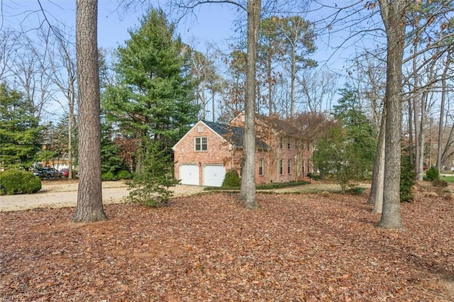 view of yard with a garage