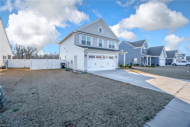 front of property with a garage