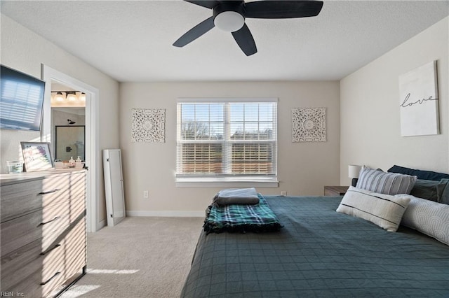 bedroom featuring ceiling fan and light colored carpet