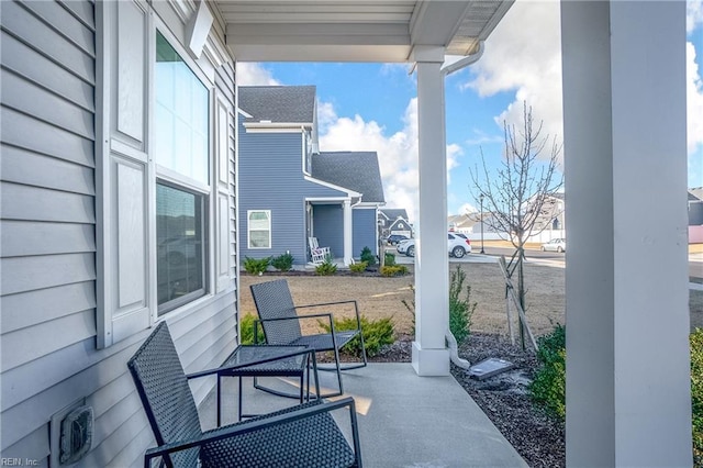 view of patio featuring a porch