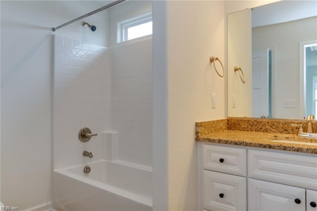 bathroom featuring vanity and shower / bath combination