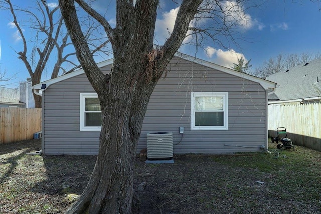 view of side of property featuring cooling unit